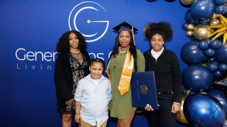 Adult student enjoys graduation ceremony with help from single parent scholarship.