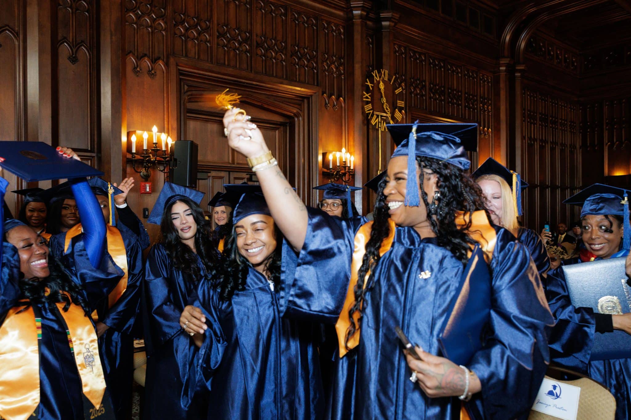 Legal studies online major students from Generations College celebrate graduating.